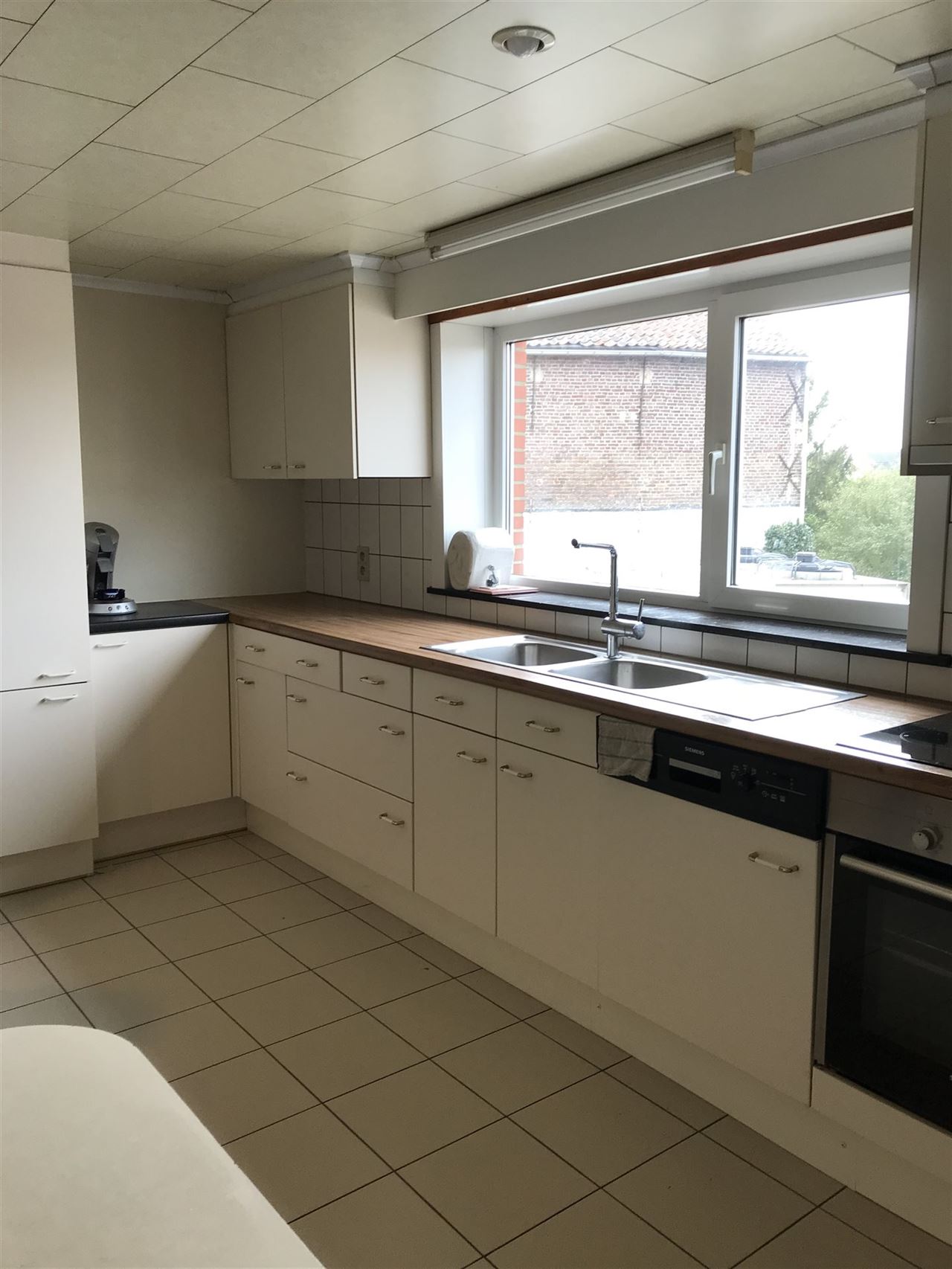 Ruime woonst met handelszaak