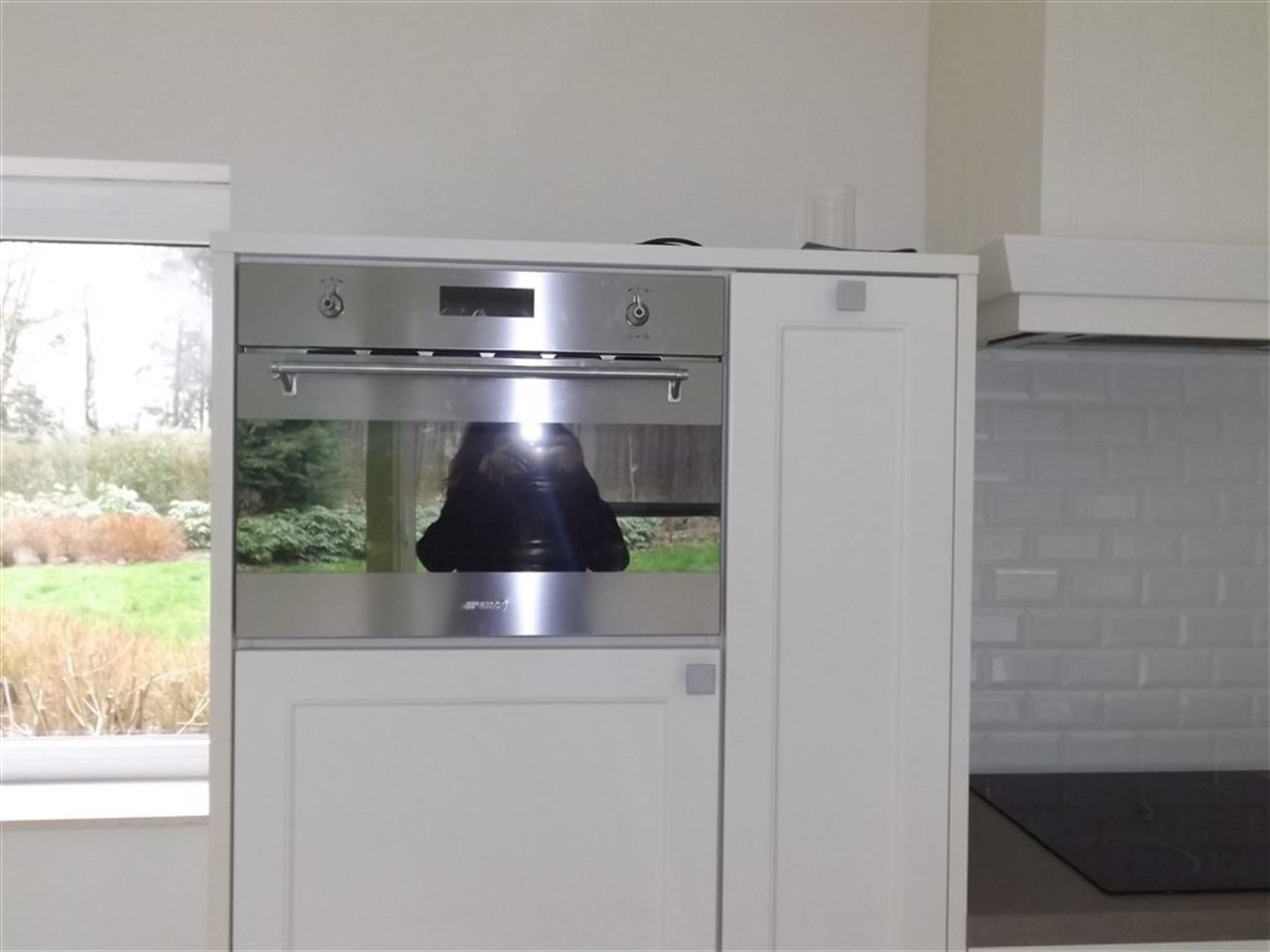 Landhuis met private weg op domein van bijna 2 hectare.