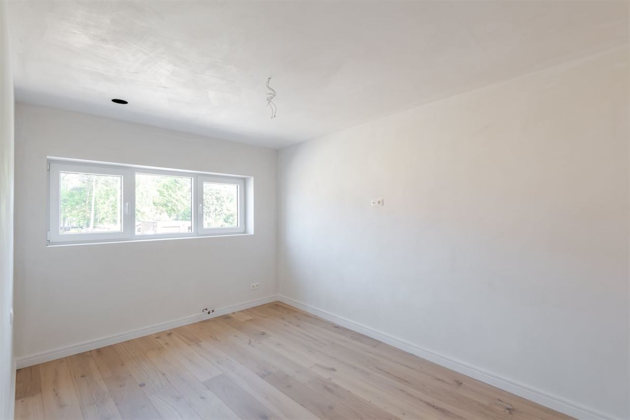 Moderne recente woning met garage en tuinterras