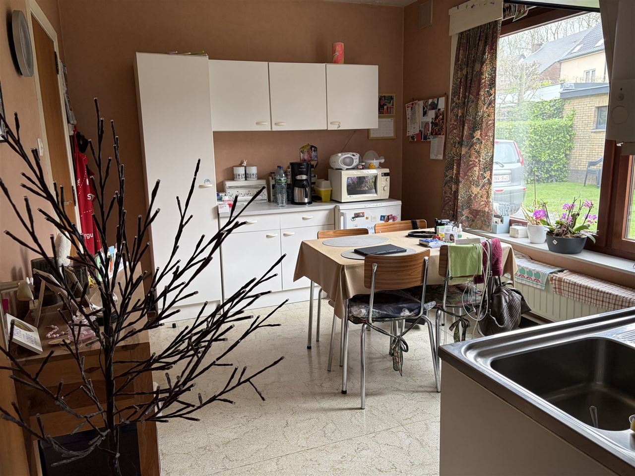 Charmant huis met gezellige tuin, garage en 3 slaapkamers.