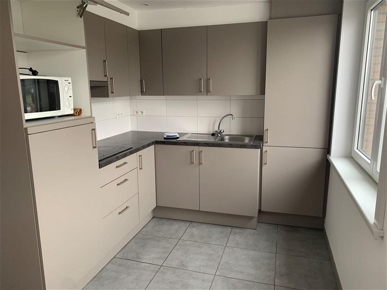 Trendy appartementje met 1 slaapkamer en garage