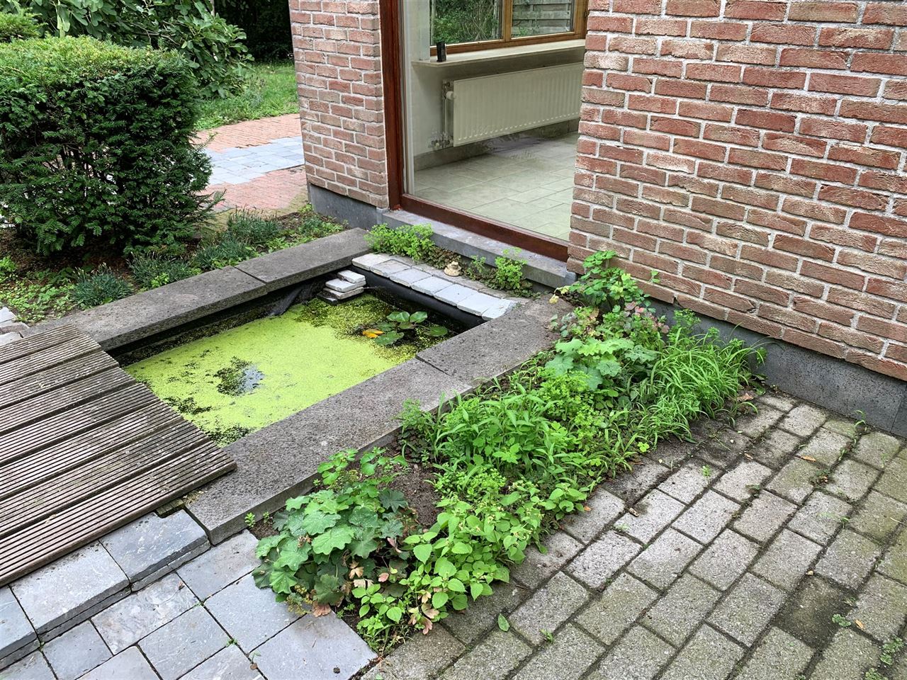 Charmant huis met 2 slaapkamers, tuin en carport.